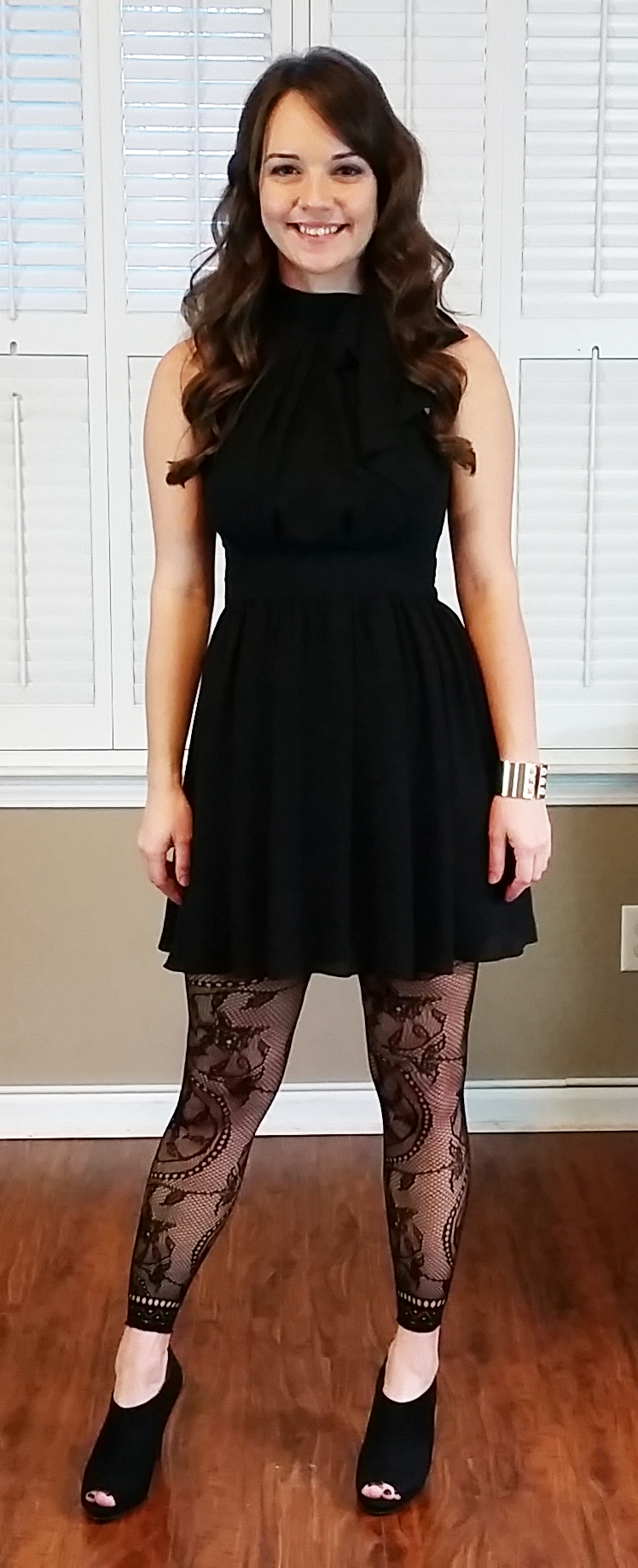 Little black dress with lace tights and 